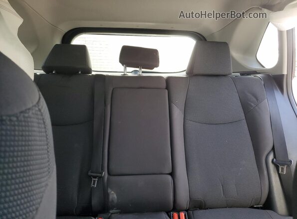 2T3F1RFV1KW027818 2019 TOYOTA LE White Vista de los asientos traseros