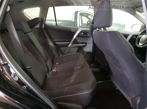 2T3RFREV1JW824472 2018 TOYOTA RAV4 Черный Вид задней части салона
