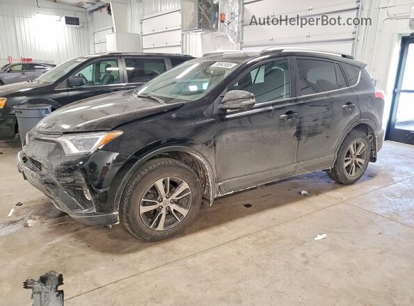 2T3RFREV1JW824472 2018 TOYOTA RAV4 Черный Передняя левая четверть