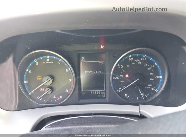 2T3RFREV4JW844599 2018 TOYOTA LE Silver Vista de los asientos traseros