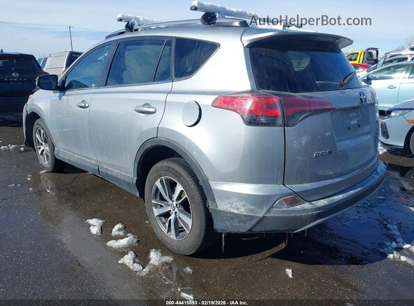2T3RFREV4JW844599 2018 TOYOTA LE Silver Trasero izquierdo