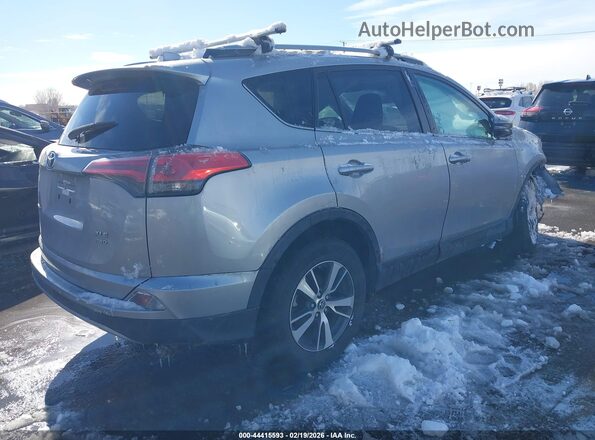 2T3RFREV4JW844599 2018 TOYOTA LE Silver Trasero derecho