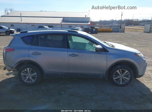 2T3RFREVXGW537088 2016 TOYOTA LE Серебряный Вид задней части салона