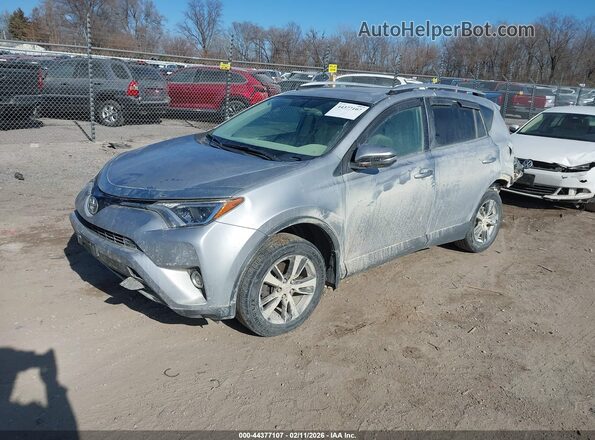 2T3RFREVXGW537088 2016 TOYOTA LE Серебряный Передняя левая четверть