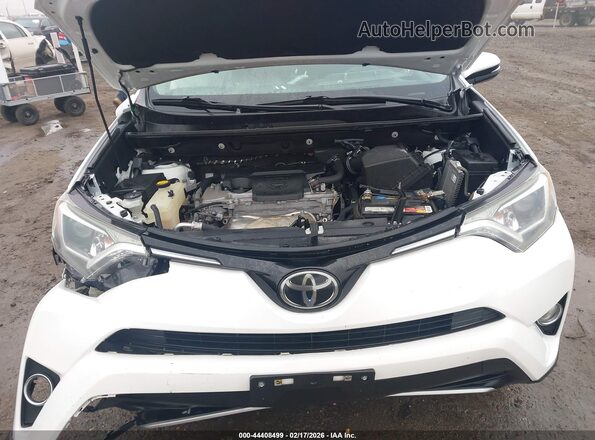 2T3WFREV2JW422074 2018 TOYOTA LE White Vista trasera