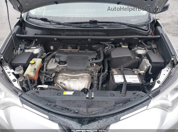 2T3ZFREV2GW267113 2016 TOYOTA LE Серебряный Вид сзади