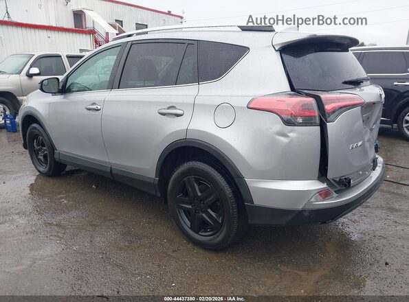 2T3ZFREV2GW267113 2016 TOYOTA LE Серебряный Задняя левая четверть