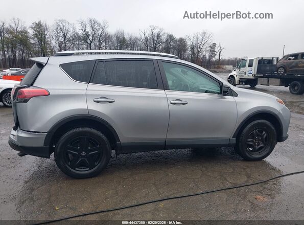 2T3ZFREV2GW267113 2016 TOYOTA LE Серебряный Вид задней части салона