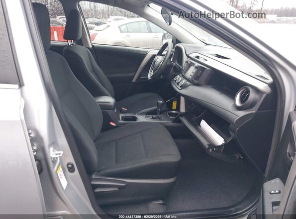 2T3ZFREV2GW267113 2016 TOYOTA LE Серебряный Вид салона спереди