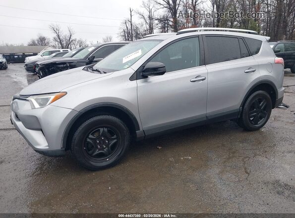 2T3ZFREV2GW267113 2016 TOYOTA LE Серебряный Передняя левая четверть