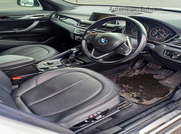 WBXHT3C3XGP880243 2016 BMW X1 White Rear view