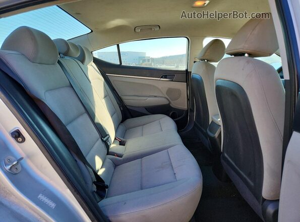 KMHD74LFXJU646141 2018 HYUNDAI ELANTRA Серебряный Вид задней части салона