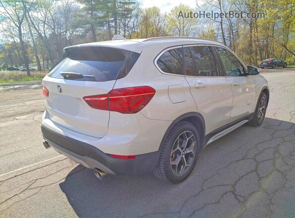 WBXHT3C3XGP880243 2016 BMW X1 White Front view
