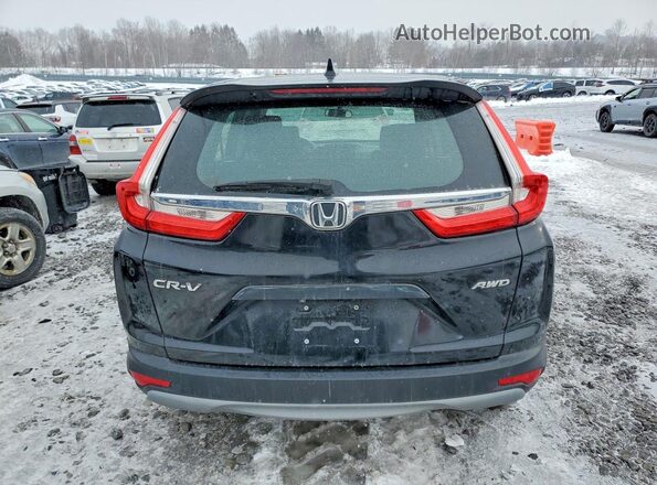 2HKRW6H36HH223973 2017 HONDA CRV Черный Вид салона спереди