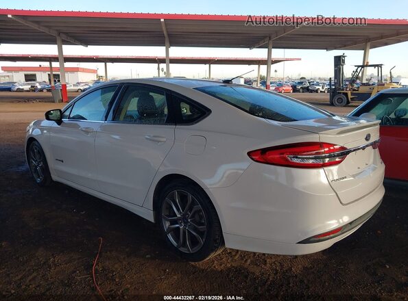 3FA6P0LU2HR299917 2017 FORD FUSION HYBRID White Rear interior view