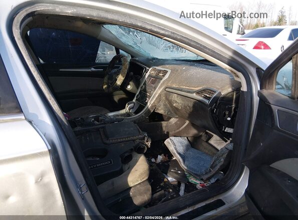 3FA6P0UU9GR251506 2016 FORD FUSION HYBRID Серебряный Вид салона спереди