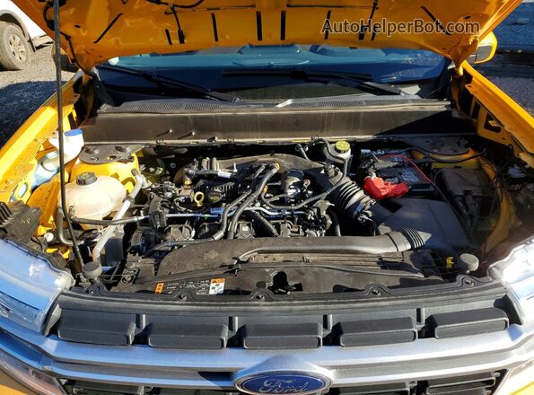 3FTTW8F93PRA64320 2023 FORD MAVERICK Желтый Вид задней части салона