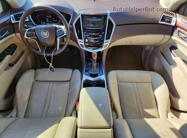 3GYFNBE35GS581406 2016 CADILLAC SRX Белый Вид панели приборов