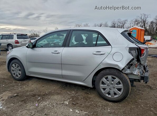 3KPA25AD0PE573138 2023 KIA RIO Silver Trasero izquierdo