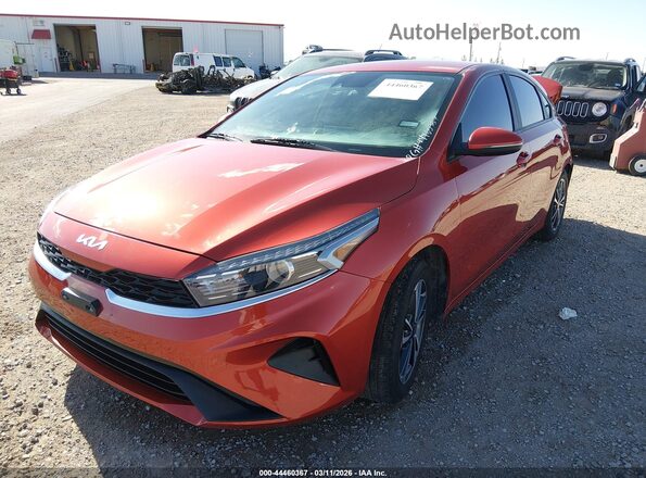3KPF24AD8PE680941 2023 KIA FORTE Оранжевый Передняя левая четверть