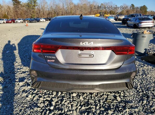3KPF24ADXPE596975 2023 KIA FORTE Серый Вид сзади