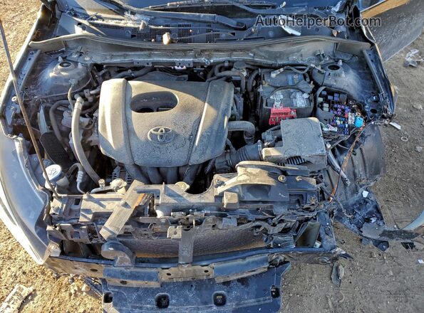 3MYDLBYV4JY328874 2018 TOYOTA YARIS Черный Вид задней части салона