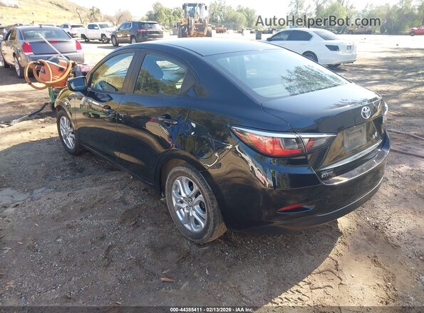 3MYDLBYVXHY177923 2017 TOYOTA YARIS IA Black Rear left