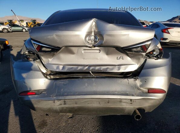 3MYDLBZVXGY102328 2016 TOYOTA SCION Серебряный Вид сзади