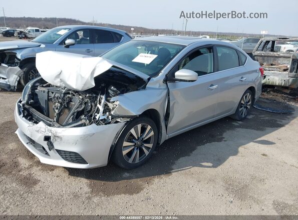 3N1AB7AP1KY446608 2019 NISSAN SENTRA Silver Vista tres cuartos delantera izquierda