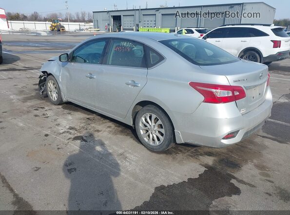 3N1AB7AP9KY262288 2019 NISSAN SENTRA Серебряный Задняя левая четверть