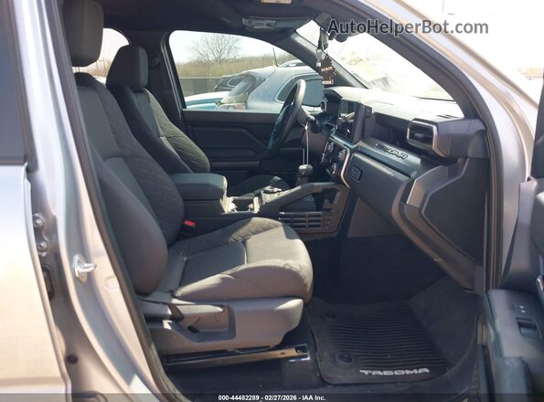 3TMLB5JN3TM209264 2026 TOYOTA TACOMA Silver Front interior view