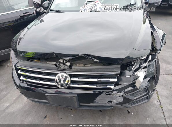 3VV1B7AX4LM039289 2020 VOLKSWAGEN TIGUAN Black Widok wnętrza z tyłu