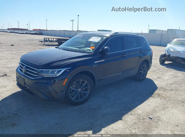 3VV3B7AX0RM002709 2024 VOLKSWAGEN TIGUAN Black Rear interior view
