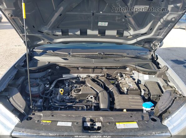 3VVEX7B23PM307552 2023 VOLKSWAGEN TAOS Gray Rear view