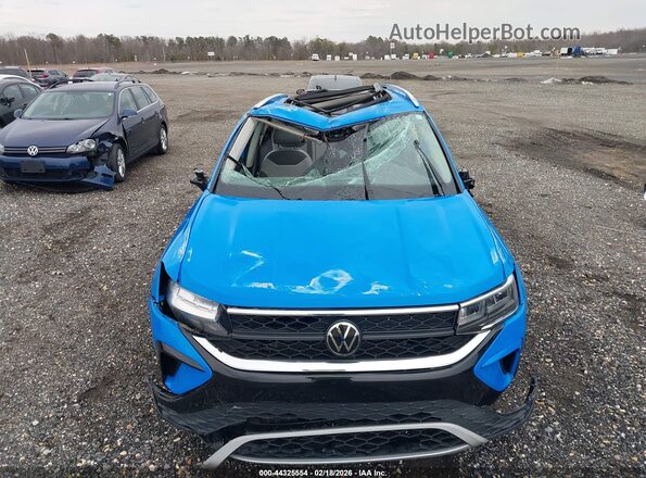 3VVEX7B23PM339790 2023 VOLKSWAGEN TAOS Blue Widok z przodu