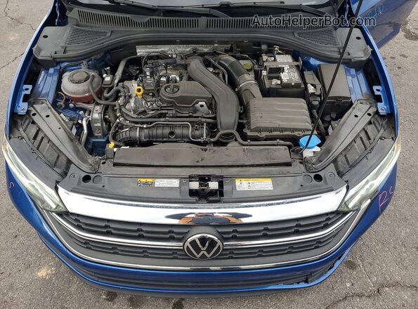 3VW7M7BU1RM040686 2024 VOLKSWAGEN JETTA Синий Вид задней части салона