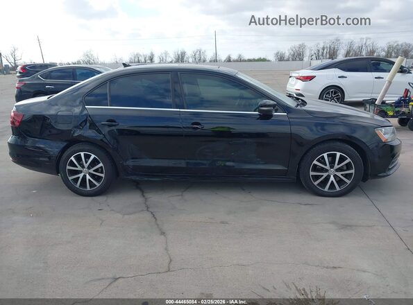 3VWDB7AJ4HM415744 2017 VOLKSWAGEN JETTA Черный Вид задней части салона