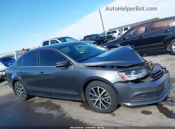 3VWDB7AJ8JM219831 2018 VOLKSWAGEN JETTA Серый Вид задней части салона