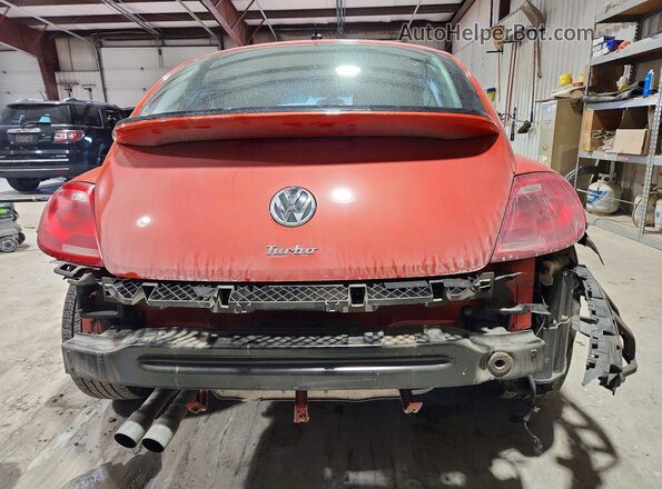 3VWF17AT2GM632012 2016 VOLKSWAGEN BEETLE Orange Հետևի տեսք