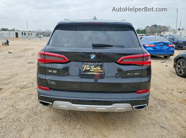 5UXCR6C51KLL02491 2019 BMW X5 Black Vista interior delantera