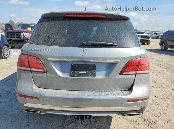 4JGDA5JB3GA639033 2016 MERCEDES-BENZ GLE Серебряный Вид сзади