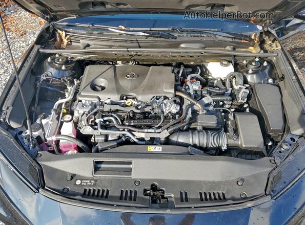 4T1DAACK8SU616814 2025 TOYOTA CAMRY Black Սալոնի հետևի տեսք