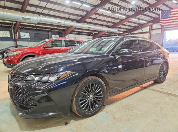 4T1EA1AB9MU005247 2021 TOYOTA AVALON Черный Передняя левая четверть