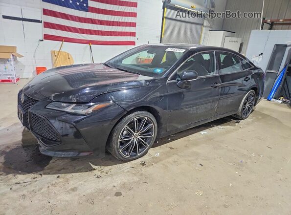 4T1GZ1FB5NU081978 2022 TOYOTA AVALON Черный Передняя левая четверть