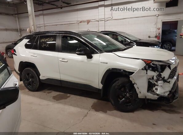4T3E6RFV9MU041157 2021 TOYOTA RAV4 HYBRID Белый Вид задней части салона