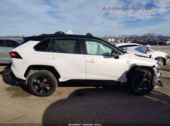 4T3E6RFVXMU036548 2021 TOYOTA RAV4 HYBRID White Rear interior view