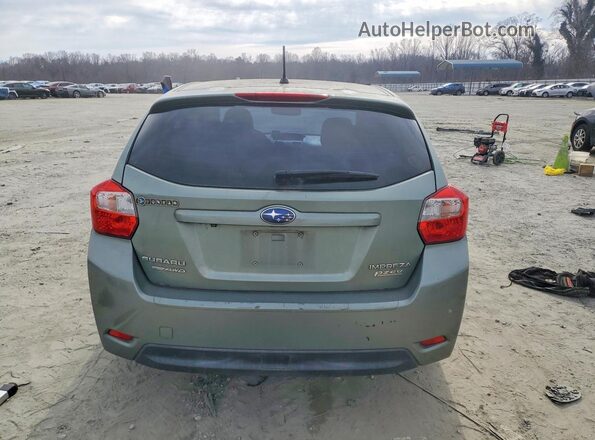 JF1GPAB6XGH221902 2016 SUBARU IMPREZA Зеленый Вид салона спереди