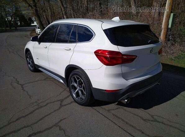 WBXHT3C3XGP880243 2016 BMW X1 White Front right