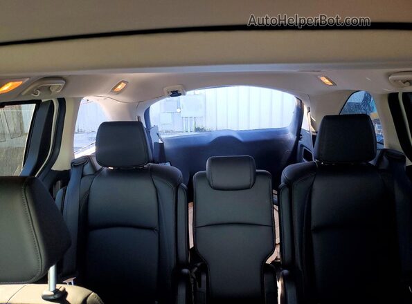 5FNRL6H65TB007249 2026 HONDA ODYSSEY White Vista de los asientos traseros