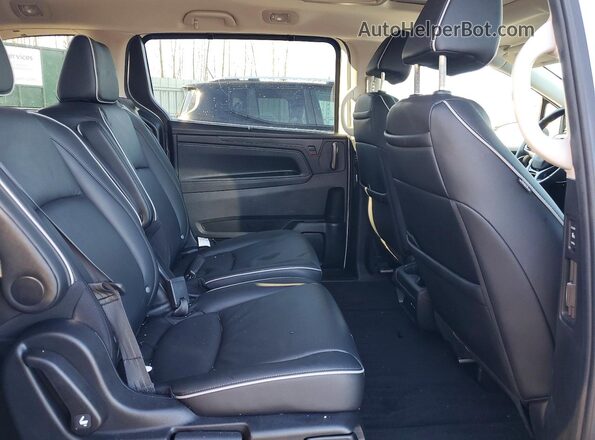 5FNRL6H81SB012660 2025 HONDA ODYSSEY White Widok wnętrza z tyłu
